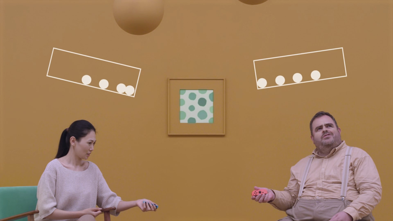 A couple of actors play 1-2-Switch’s marble counting mini-game (Photo: Nintendo)